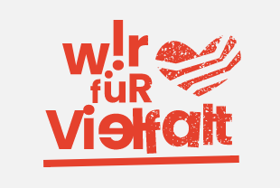 Wir für Vielfalt Logo. Rote Schrift auf weißem Grund mit Herz